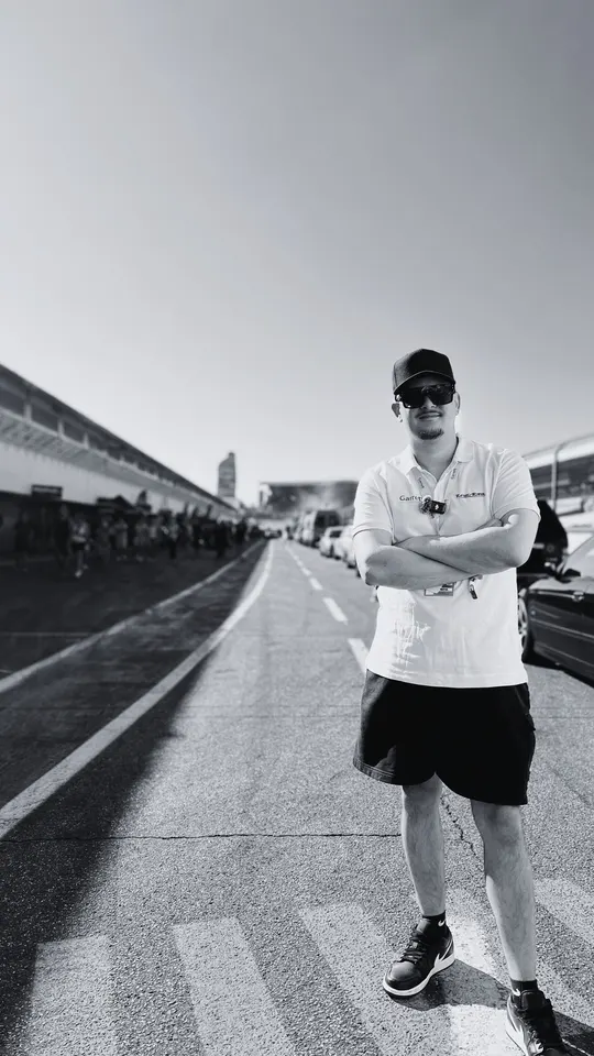 Black and white portrait in the pit lane